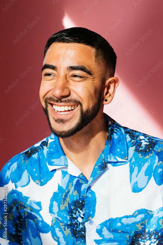 portrait-of-latino-gay-man-in-studio-environment-stock-photo-adobe-stock