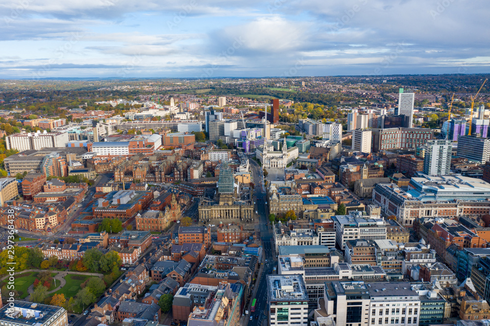 Aerial photo of the Leeds town centre in the UK showing the Leeds Town Hall with construction work being done on the tower