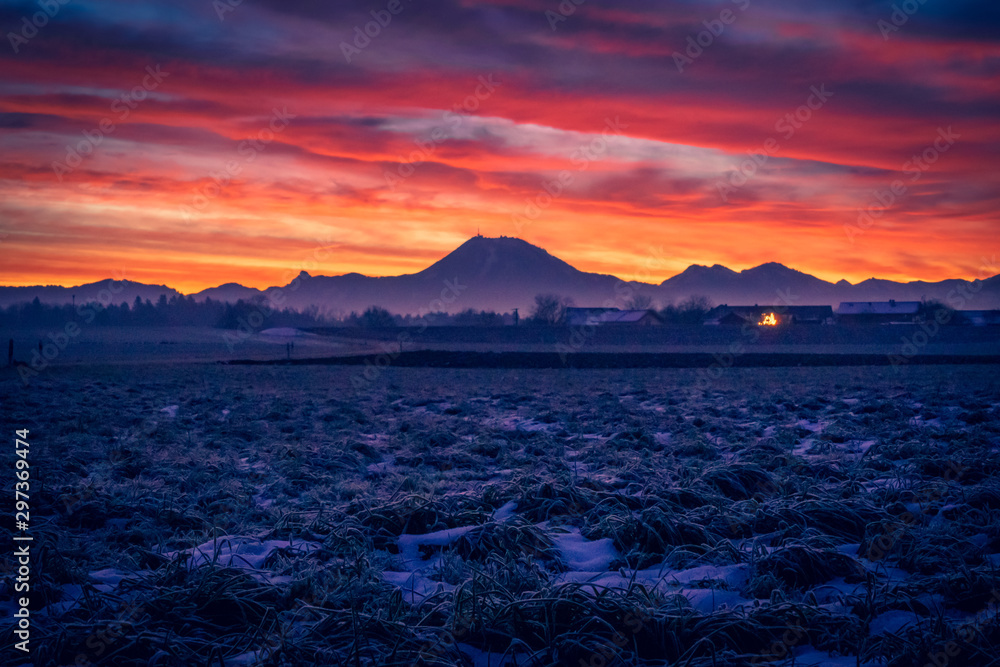 Beautiful sunset in the alps of Berchtesgadener Land Germany on a cold winter day Beautiful sunset in the alps of Berchtesgadener Land Germany on a cold winter day