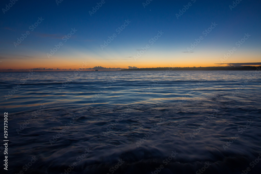sunset at the sea in domentican republic