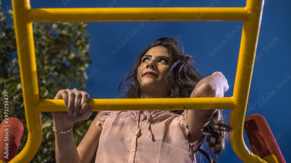 Obraz premium Beautiful woman in the playground