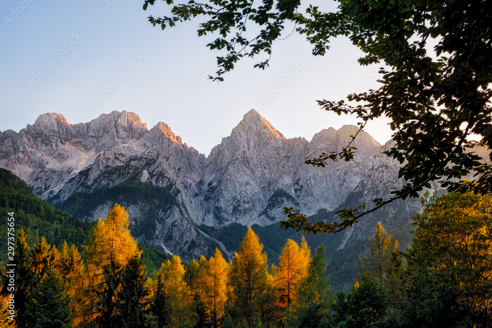 Landscape view of mountain peaks and colorful autumn foliage, Triglav, Slovenia