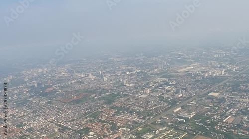 Airplane fly around the city to see PM2.5 Particulate matter photo