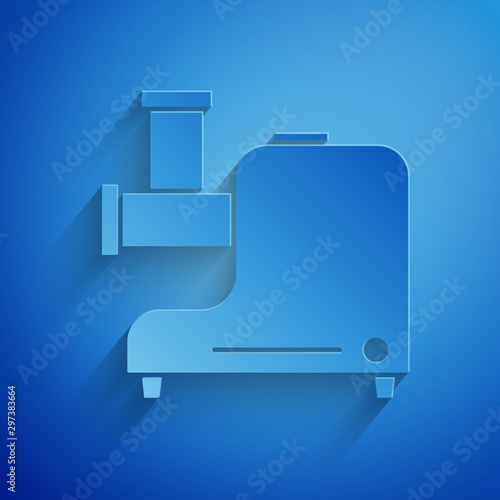 Paper cut Kitchen meat grinder icon isolated on blue background. Paper art style. Vector Illustration