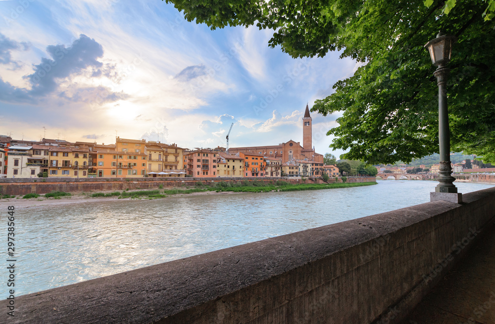 Panoramic view on the dige river in the evening in Verona