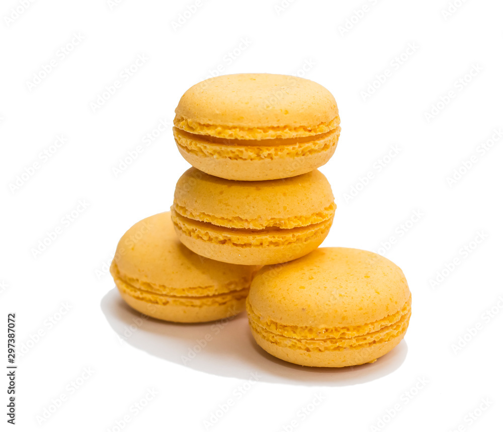 four yellow macaroons on a white background isolated four yellow macaroons on a white background isolated