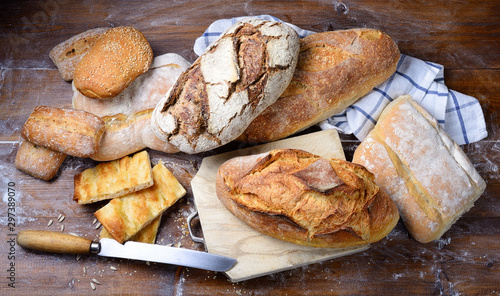 Assorted bread on wood background. Top view