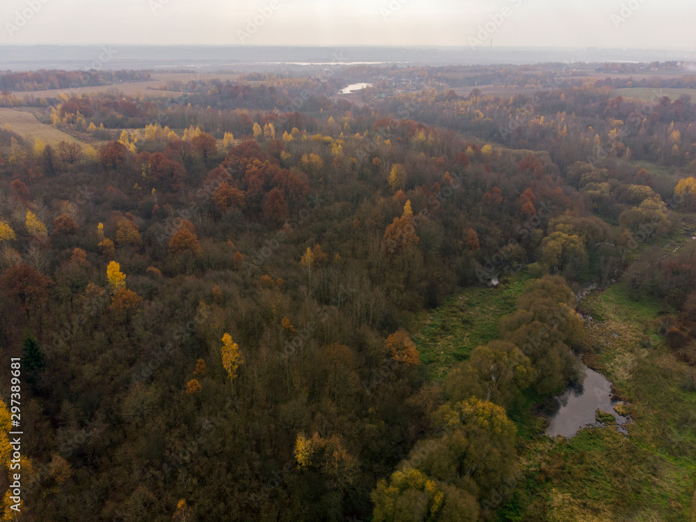 Aerial view drone amazing sunset over of the village and fields. Aerial view drone amazing sunset over of the village and fields.