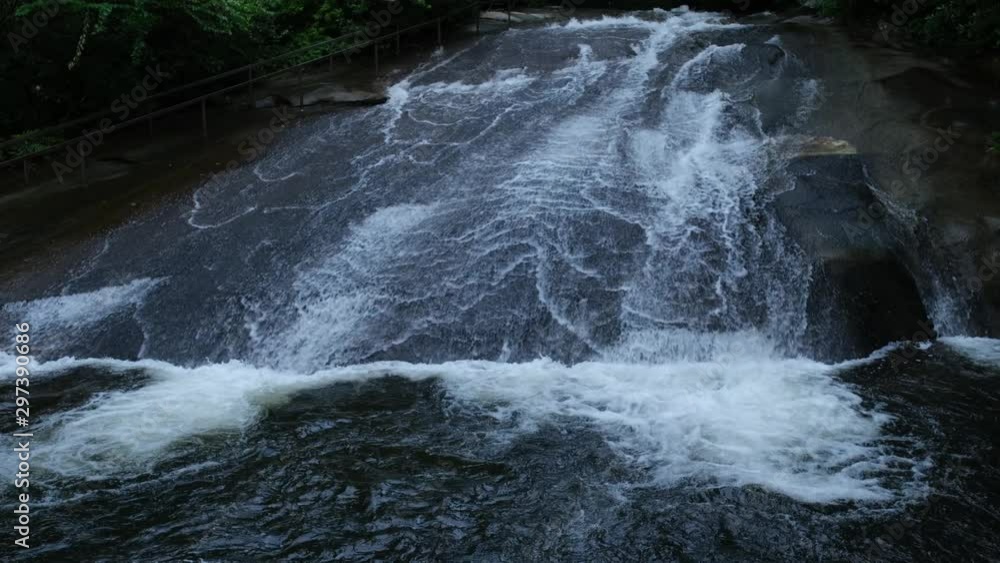 Sliding Rock, a popular waterfall and destination in Brevard, near Asheville, North Carolina in the Blue Ridge Mountains Sliding Rock, a popular waterfall and destination in Brevard, near Asheville, North Carolina in the Blue Ridge Mountains