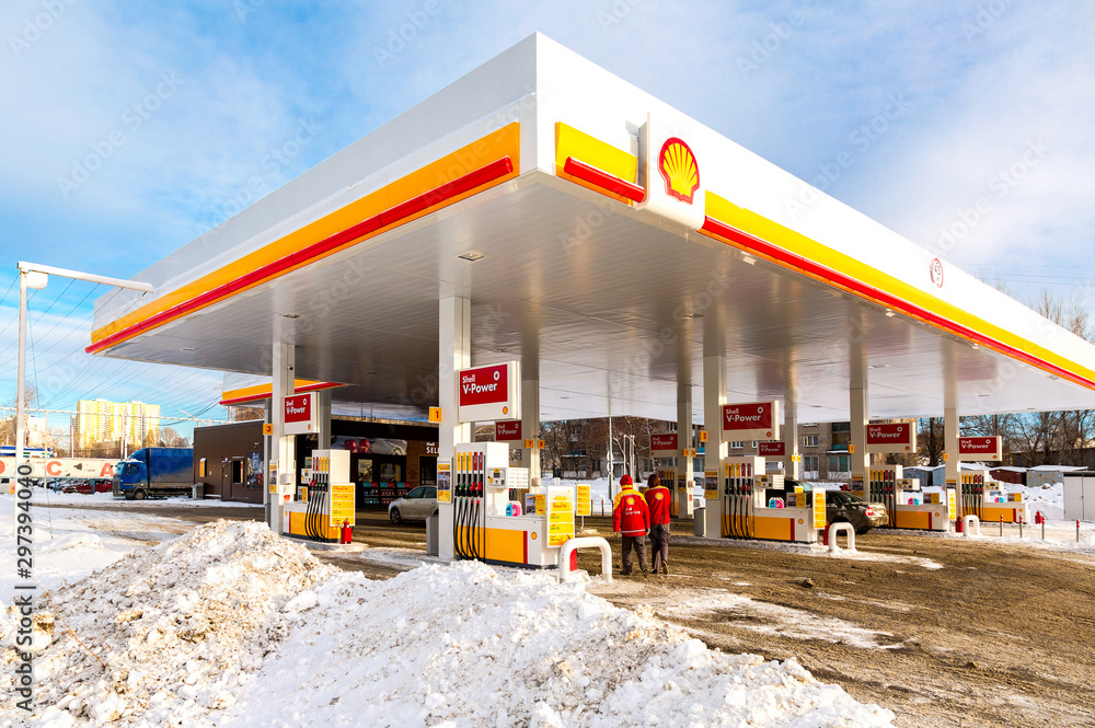 Shell gas station in winter day. Royal Dutch Shell is an Anglo-Dutch  multinational oil and gas company Stock Photo | Adobe Stock