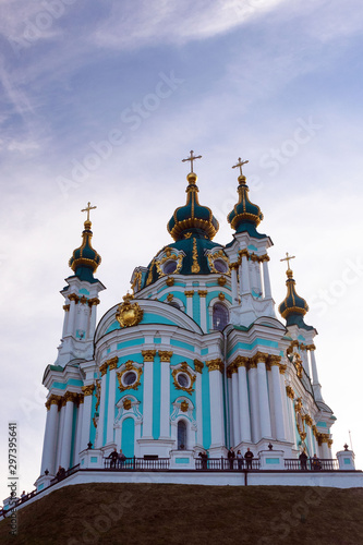 Kiev, Ukraine, October 2019. St. Andrew's Orthodox Church on St. Andrew's Uzvoz in the Ukrainian capital, Kiev. Golden domes against the blue sky.