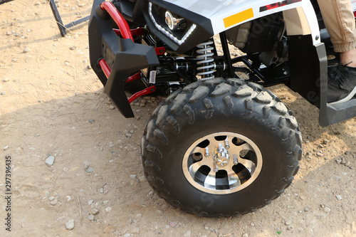 ATV front suspension with wheel.