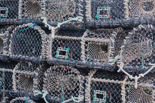 Lobster creels stacked on an English quayside