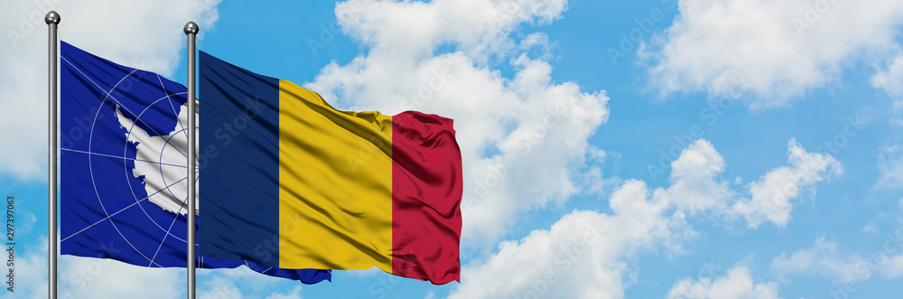 Antarctica and Chad flag waving in the wind against white cloudy blue sky together. Diplomacy concept, international relations. Antarctica and Chad flag waving in the wind against white cloudy blue sky together. Diplomacy concept, international relations.