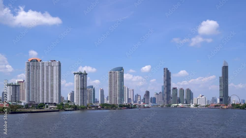 Bangkok waterfront cityscape and Chao Phraya River sunny day - Footage Video Bangkok waterfront cityscape and Chao Phraya River sunny day - Footage Video