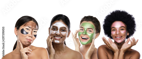 Beautiful multi-ethnic group of girls with colorful peel-off masks on their faces