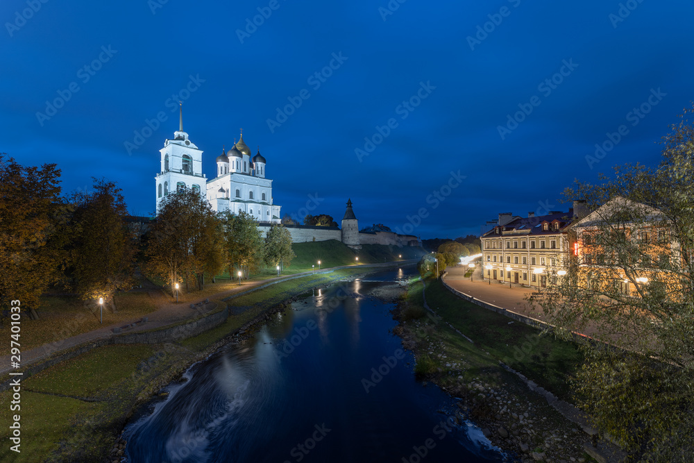 Pskov in October. The banks of the Pskova river and the Pskov Kremlin. Trinity cathedral, Pskov, Russia