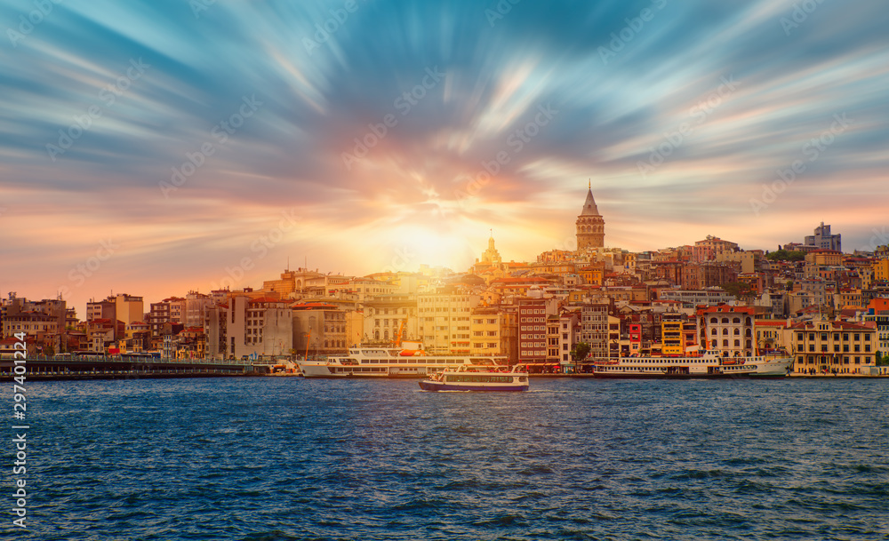 Galata Tower, Galata Bridge, Karakoy district and Golden Horn at amazing sunset sky  - Istanbul, Turkey