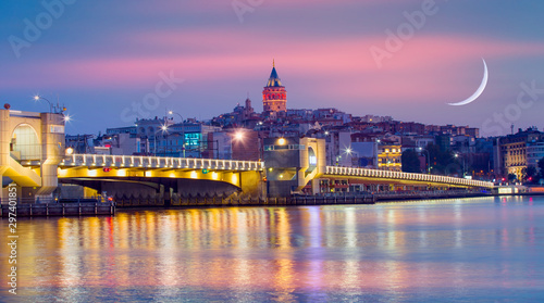 Galata Tower  Galata Bridge  Karakoy district and Golden Horn at amazing sunset sky  - Istanbul  Turkey