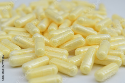 Background of many yellow medicine capsules