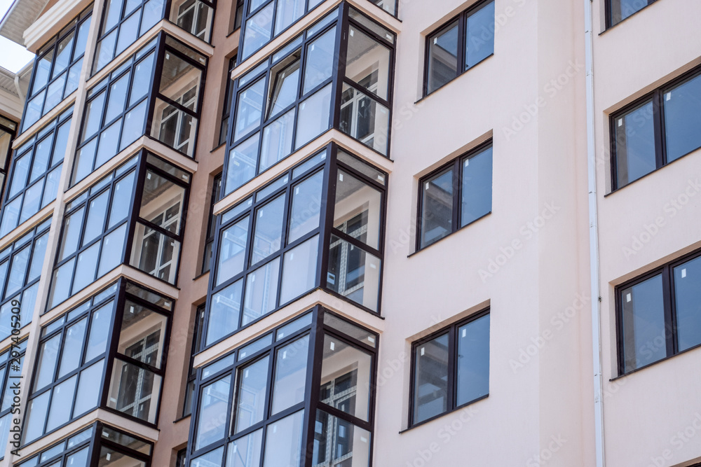 New multistorey residential building. Apartments in a new house.