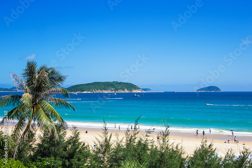 Exotic beach in Sanya on the tropical island of Hainan, South China sea, Asia