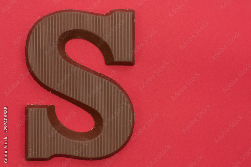 Chocolate letter S. Symbol of Dutch feast called Sinterklaas. Chocolate letter S. Symbol of Dutch feast called Sinterklaas.