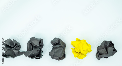 Crumpled  colorful paper is mauled on white blackground with copy space. ideas concept