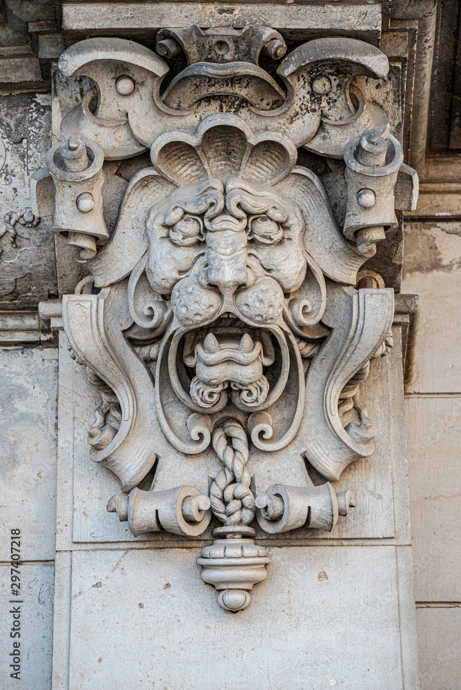 Ancient decoration element of scary lion head in downtown historical center of Dresden, Germany