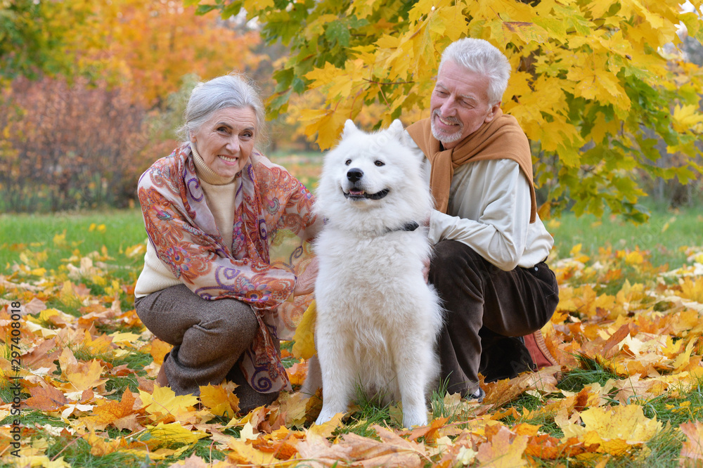 Portrait of happy senior couple in autumn park Portrait of happy senior couple in autumn park