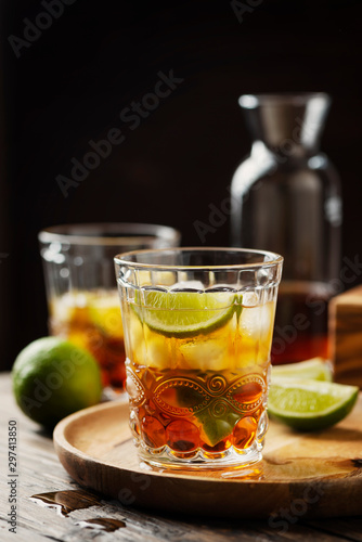 Fotografie, Obraz Strong golden rum with lime and ice