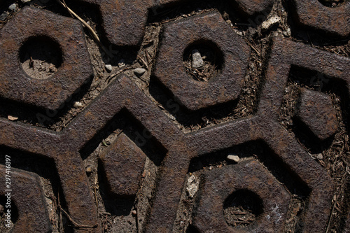 Textured rusted metal on a road and concrete.Industrial background.Abstract style.
