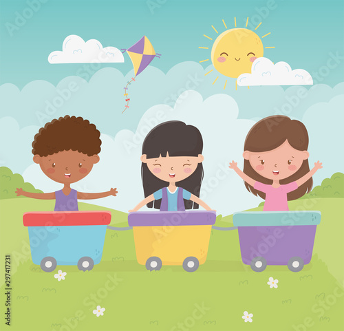 happy childrens day girls and boy playing with wagons