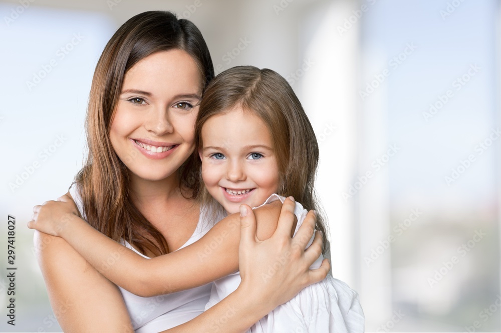 Happy Mother and daughter hugging Happy Mother and daughter hugging