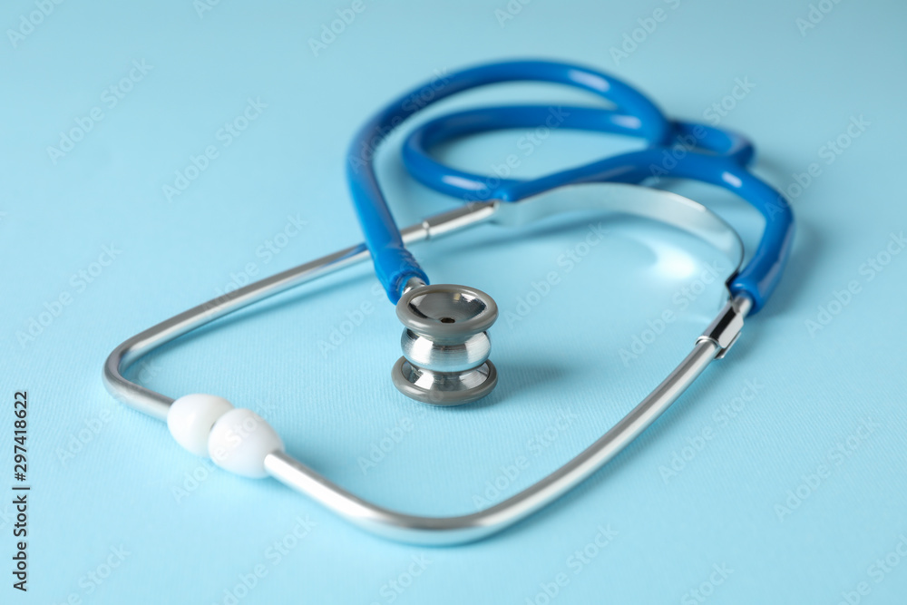 Stethoscope on blue background, close up. Healthcare Stethoscope on blue background, close up. Healthcare