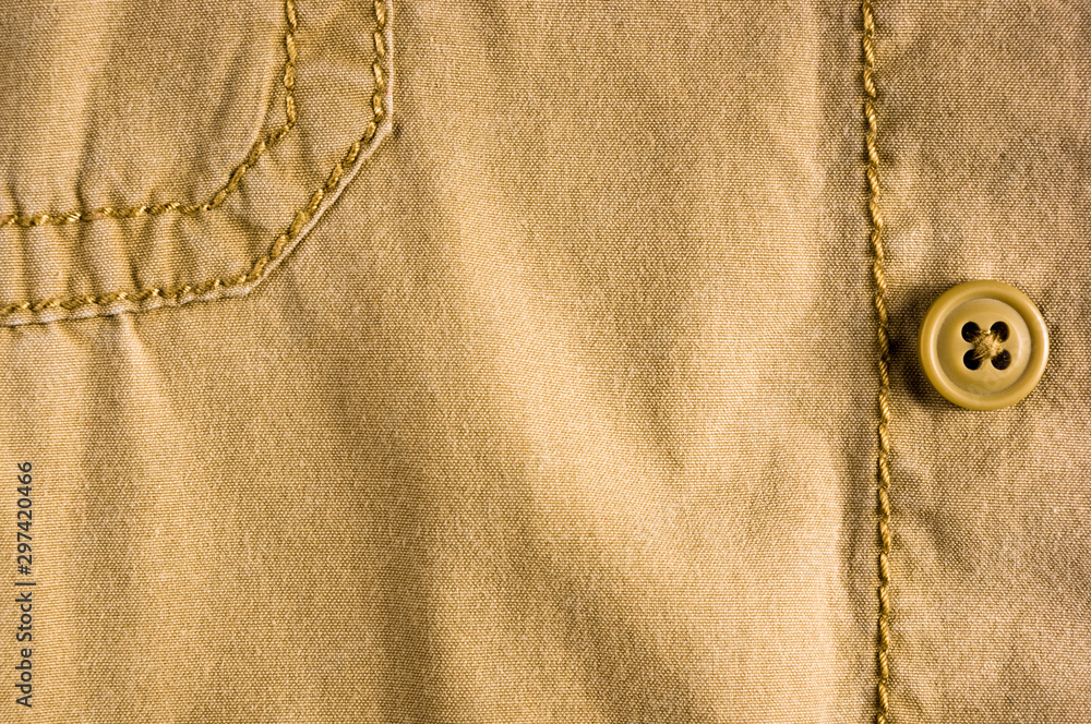 clothing items stonewashed cotton fabric texture with seams, clasps, buttons and rivets, macro clothing items stonewashed cotton fabric texture with seams, clasps, buttons and rivets, macro