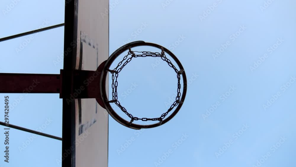 New basketball court with rubber track. Basketball hoop New basketball court with rubber track. Basketball hoop