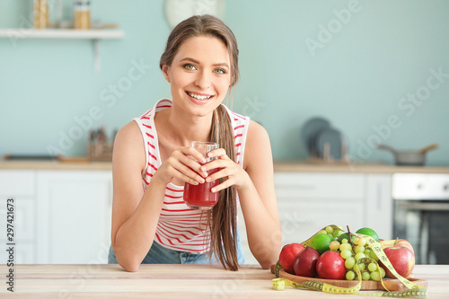 Young woman drinking health...