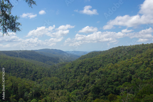 High Hilltop Lookout On A Overcast Moody Day Overlooking Lush Green Hills And Valley In Australia