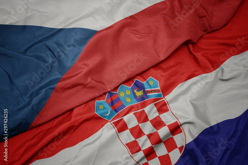 waving colorful flag of croatia and national flag of czech republic.