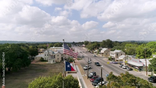 4K Drone Fredericksburg Texas with Texas Flag and American Flag Slow Motion