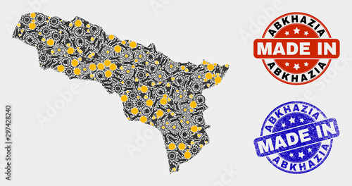 Mosaic industrial Abkhazia map and blue Made In scratched stamp. Vector geographic abstraction model for industrial, or patriotic posters. Mosaic of Abkhazia map composed from random cogs, wrenches,