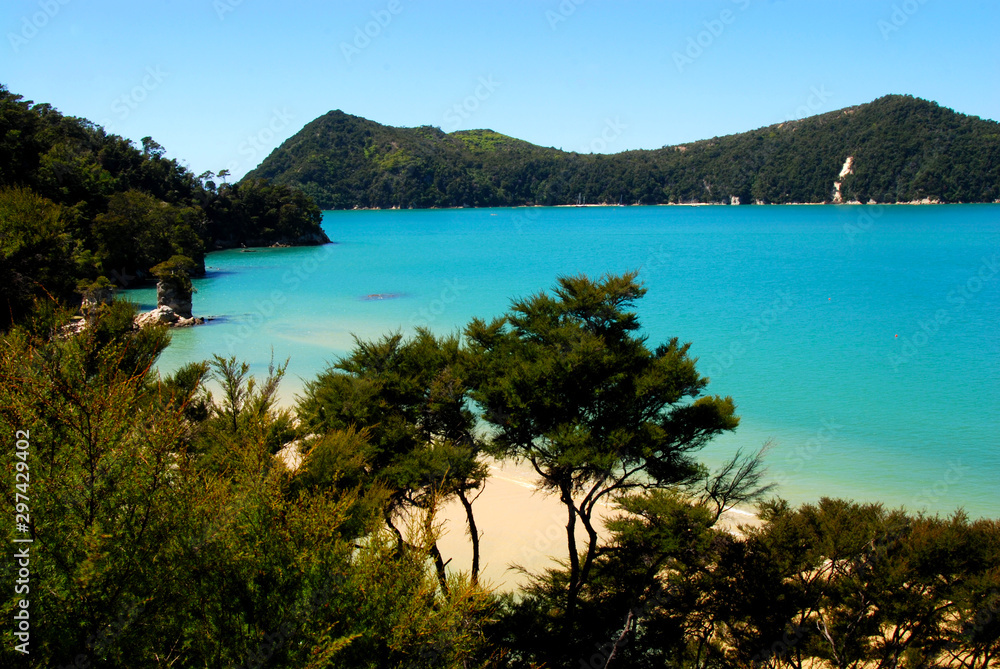 view from the Abel Tasman Coast Track to bay with turquoise waters