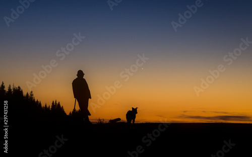 silhouette of man on top of mountain © IoanBalasanu