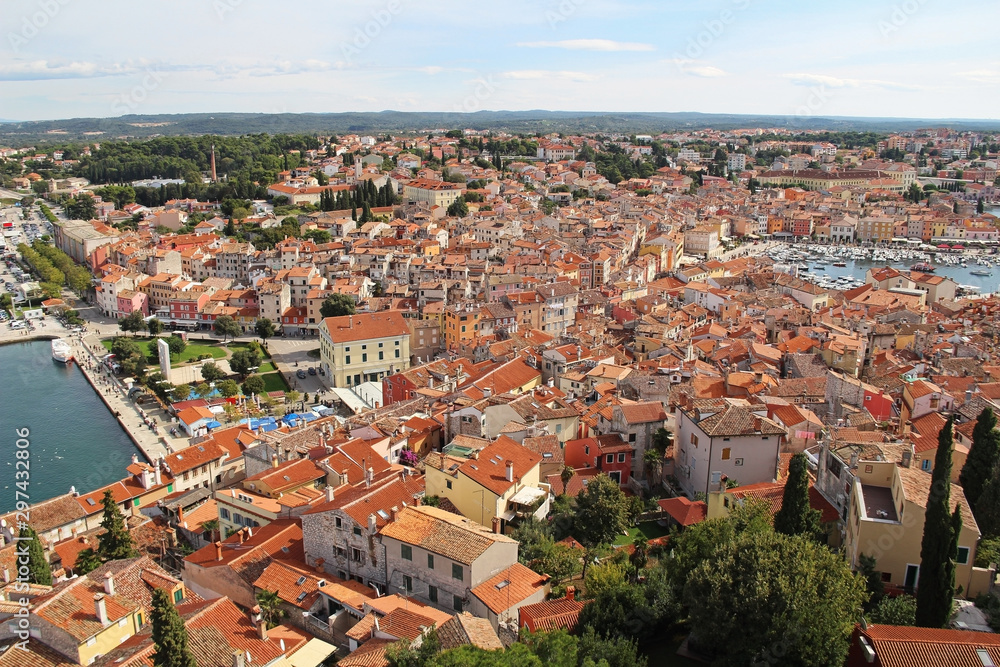 View from the bell tower of the Church of St. Euphemia on the tiled rooftops of the romantic and colorful town of Rovinj, Croatia, located in the north of the Adriatic Sea. Europe.