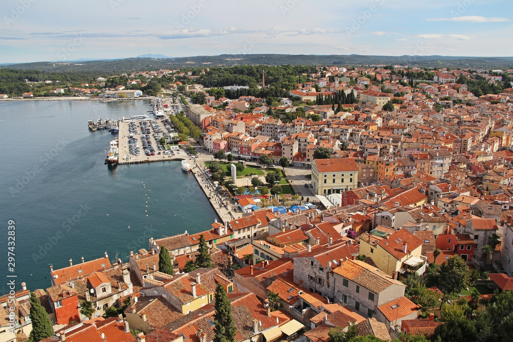 View from the bell tower of the Church of St. Euphemia on the tiled rooftops of the romantic and colorful town of Rovinj, Croatia, located in the north of the Adriatic Sea. Europe.