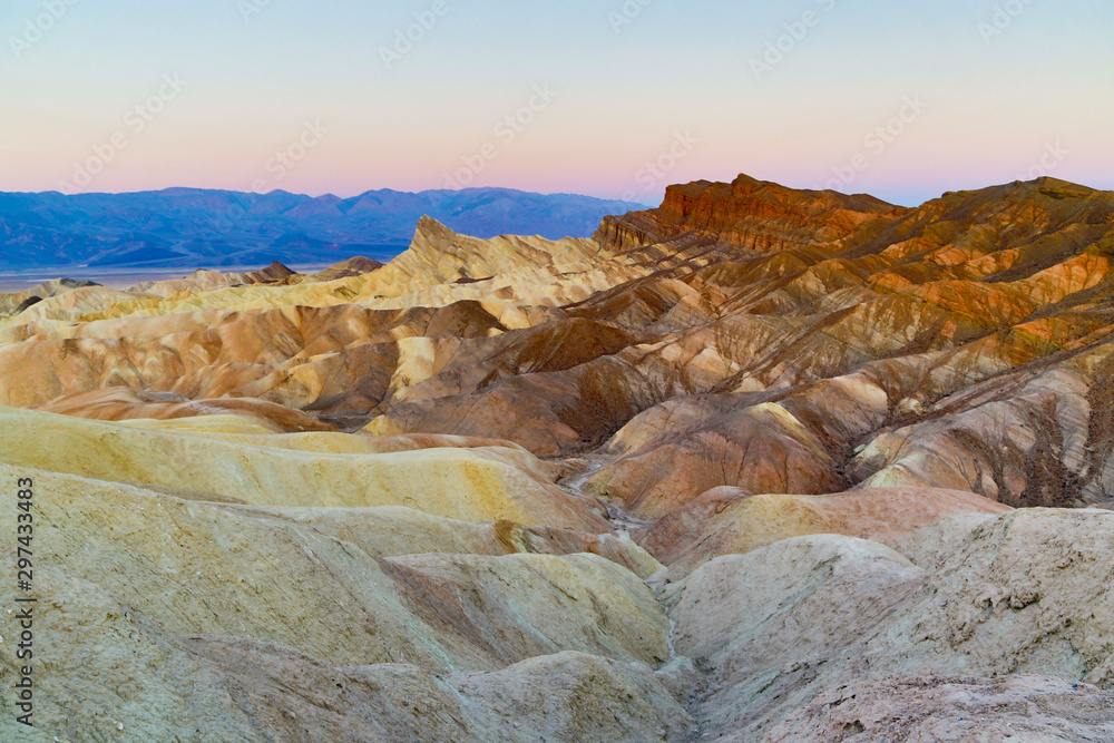 The Manly Beacon and the Red Cathedral at sunrise from Zabriske Point, Death Valley National Park, California