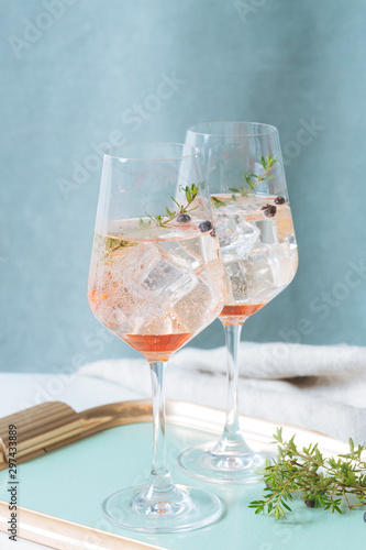 Prosecco cocktail, an aperitif with Prosecco, a white sparkling italian wine, bitter, tyme and juniper berries 