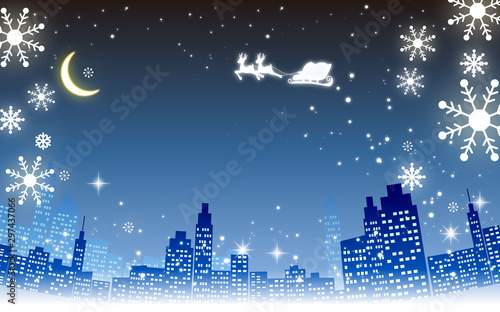 クリスマスイメージ素材・都市夜景とプレゼントを運ぶサンタとトナカイシルエット・雪の結晶