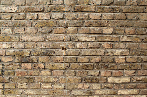 texture of an old light brick stone wall  background